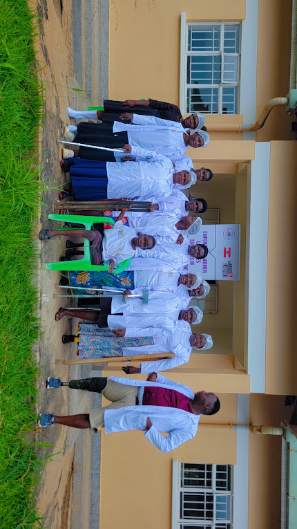 Women landmine survivors and facilitators after practical training at UIRI's Lira Peanut Research and Processing Centre